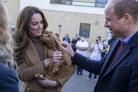 The Duke and Duchess of Cambridge meet new 'therapy puppy' Alfie, an apricot cockapoo during a visit to the Clitheroe Community Hospital (James Glossop/The Times)