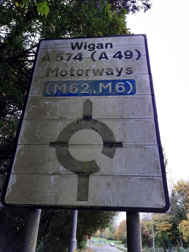 Photos show the state of road signs in the town