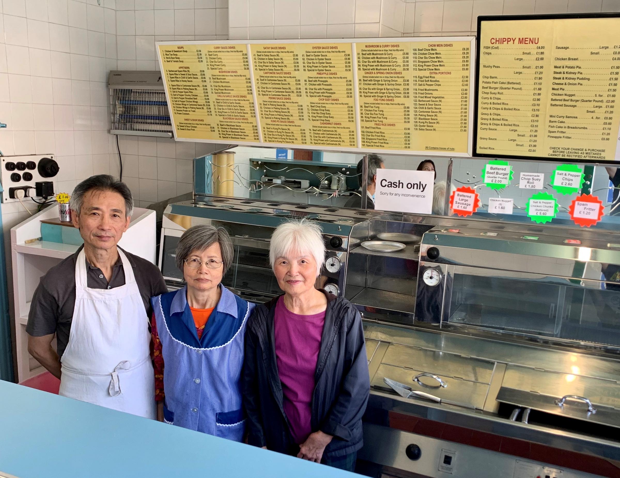 Wayne Hung, Che Mui Hung and Mrs Kong (left-right) pictured in the chippy