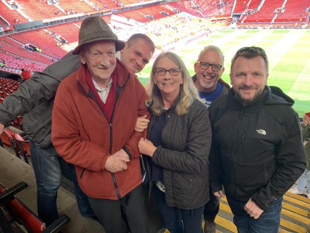 St Helens Star: Grandad George and family on a visit to Old Trafford