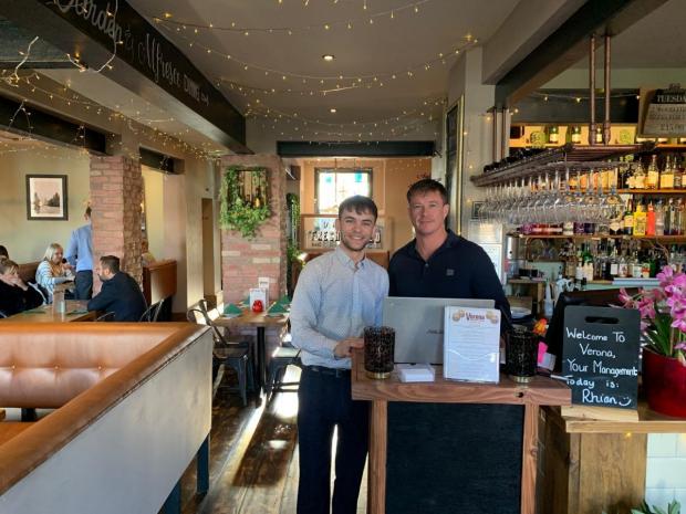 St Helens Star: Owner Andy Orgill and Toby, a supervisor at Verona