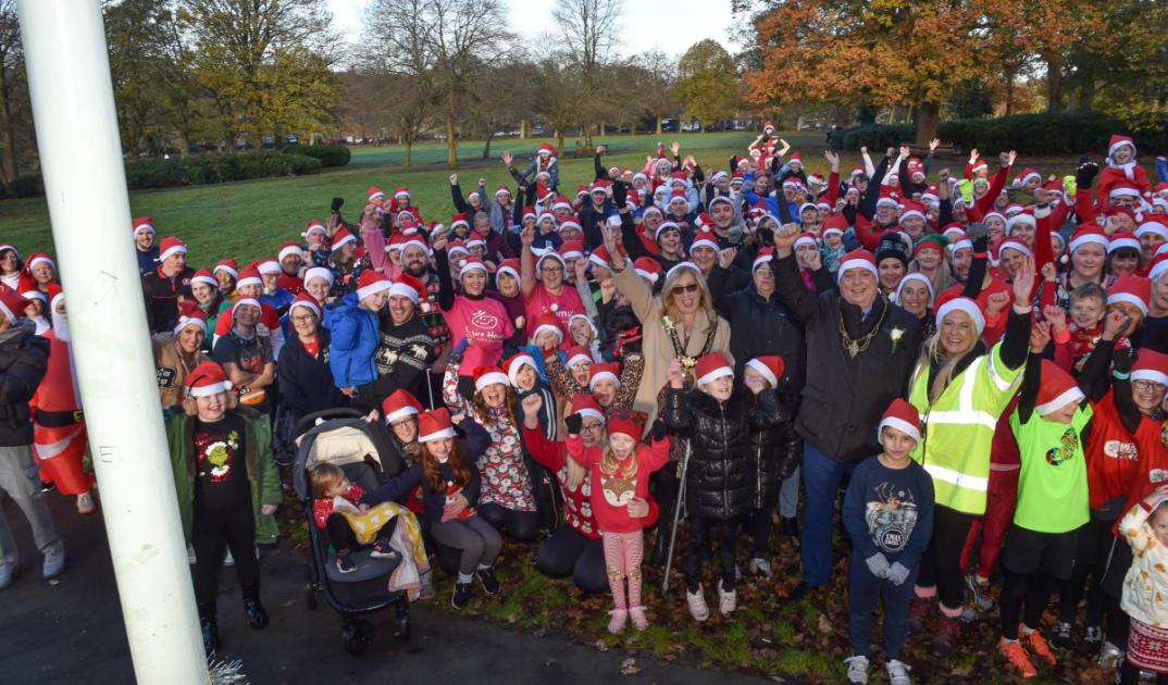 Hundreds spread festive cheer at St Helens Santa Dash in Victoria Park