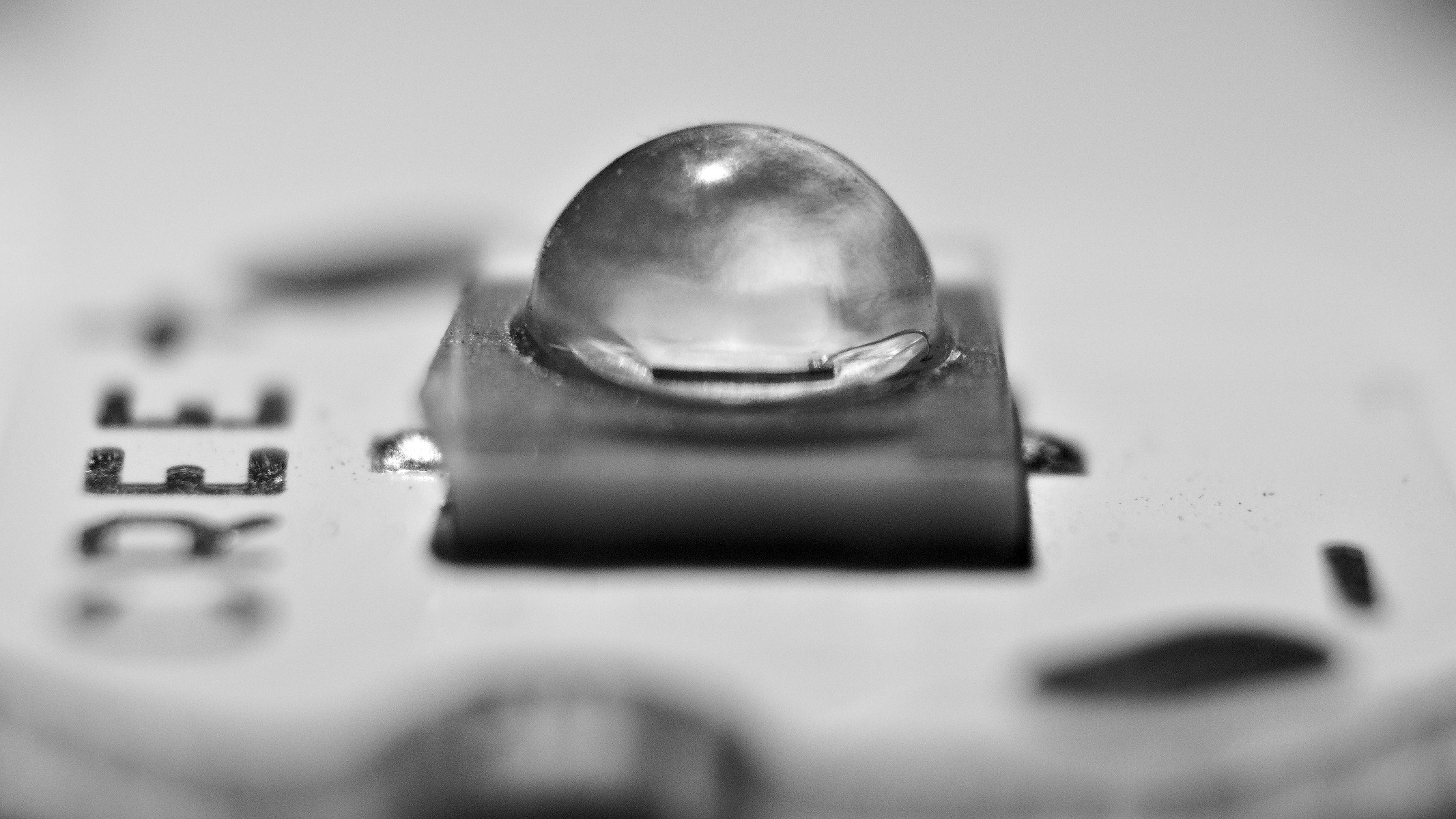 A black and white macro photo of an LED