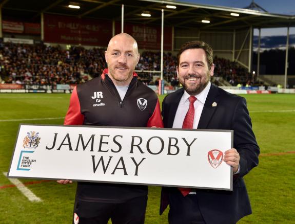 St Helens Star: James Roby holds the road sign with council leader David Baines St Helens Star: James Roby holds the road sign with council leader David Baines