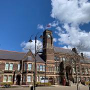 St Helens Town Hall with the flaf at half-mast