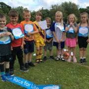 Pupils at Rectory School were sponsored by friends and family to run around the field in aid of Cancer Research UK