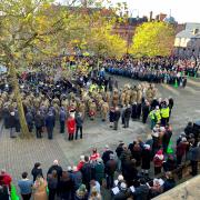 Lest We Forget: Crowds in Victoria Square for the Remembrance Sunday service