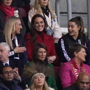 The Princess of Wales with rugby league stars Jodie Cunningham, left, and Emily Rudge, right, watching the England men's Rugby League World Cup quarter-final against Papua New Guinea at the DW Stadium in Wigan