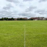 Parents spent hours mowing two pitches on Holt Fields after council disputes