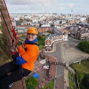 Janet Hart taking part in Cathedral abseil