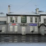 The boarded up Ship Inn on Blackbrook Road