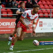 Tommy Makinson touches down