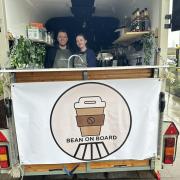 Max and Olivia inside their Bean on Board coffee trailer