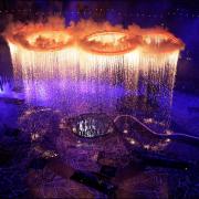 'Out of the earth came light' - The Oympic rings rose from the ground to create an amazing spectacle above the stadium.