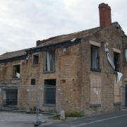 The Black Horse at Moss Bank fell into disrepair before its demolition