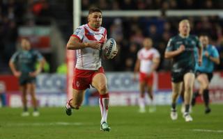 Tommy Makinson flies in for an interception try